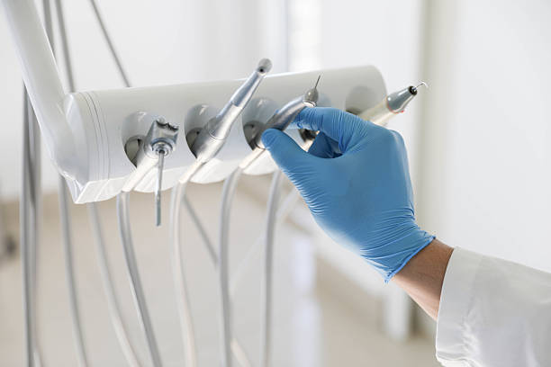 Professional Tooth Extraction technician working in Robeson County County, NC